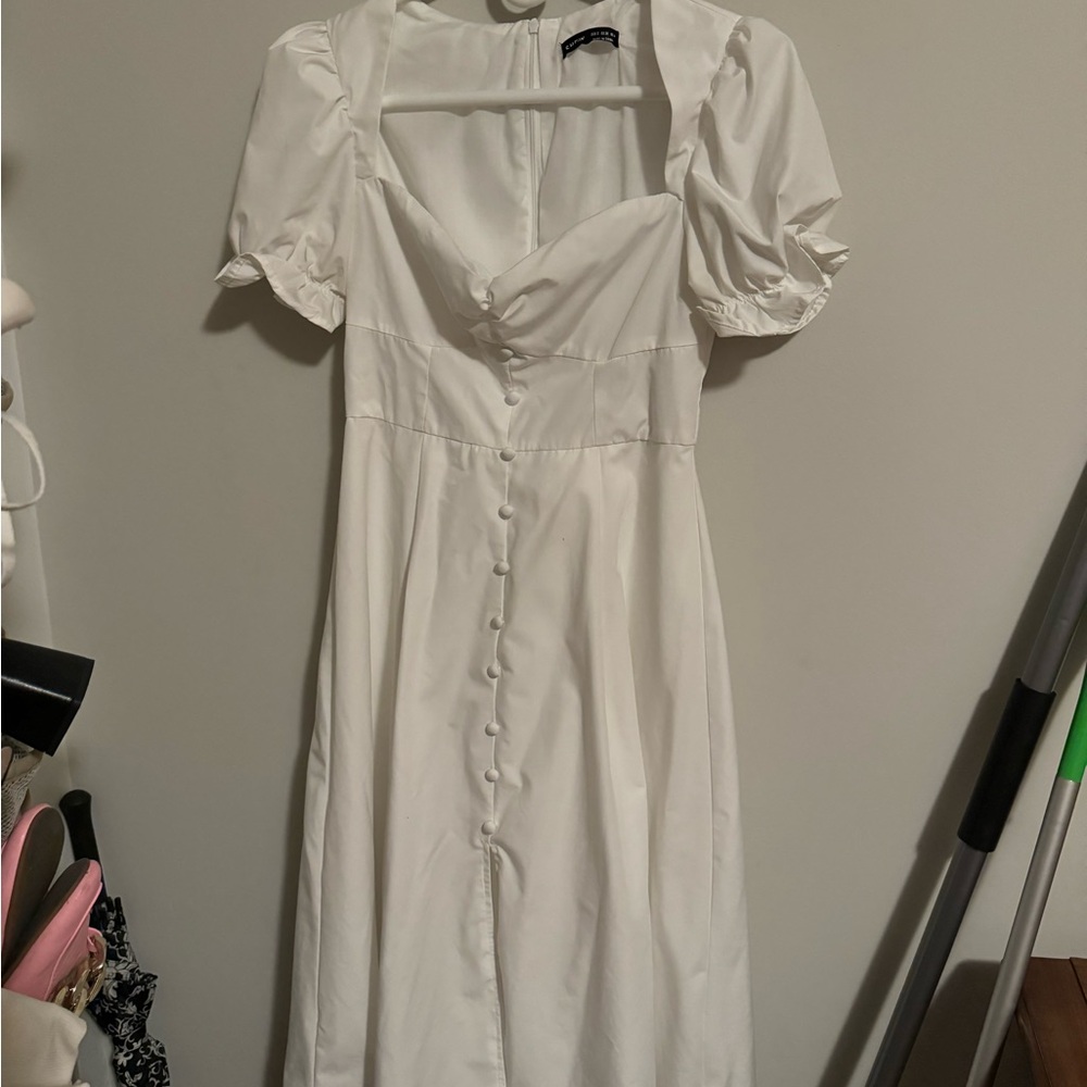 White ruffle dress with buttons